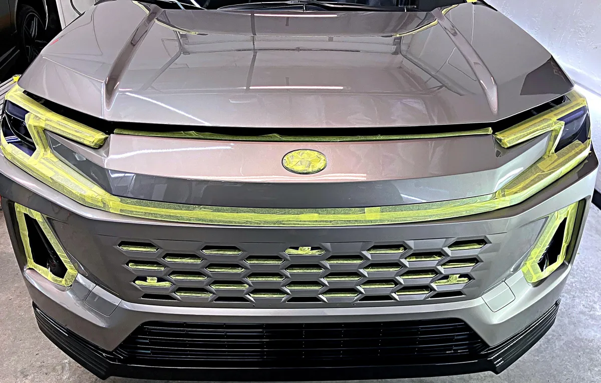Vehicle prepped with precision masking for AG Formula 1051 coating and warranty protection