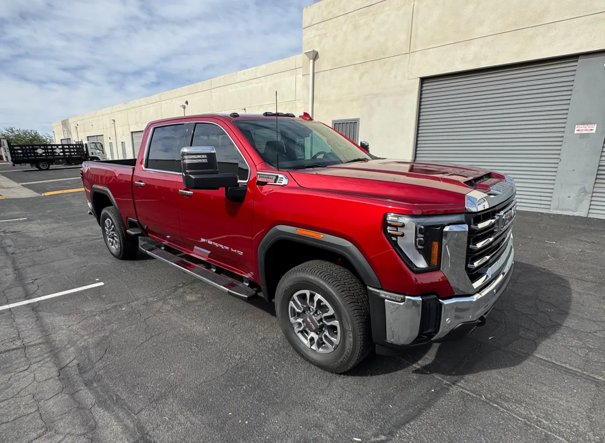 Red GMC Sierra protected against UV weathering with AG Formula 1051